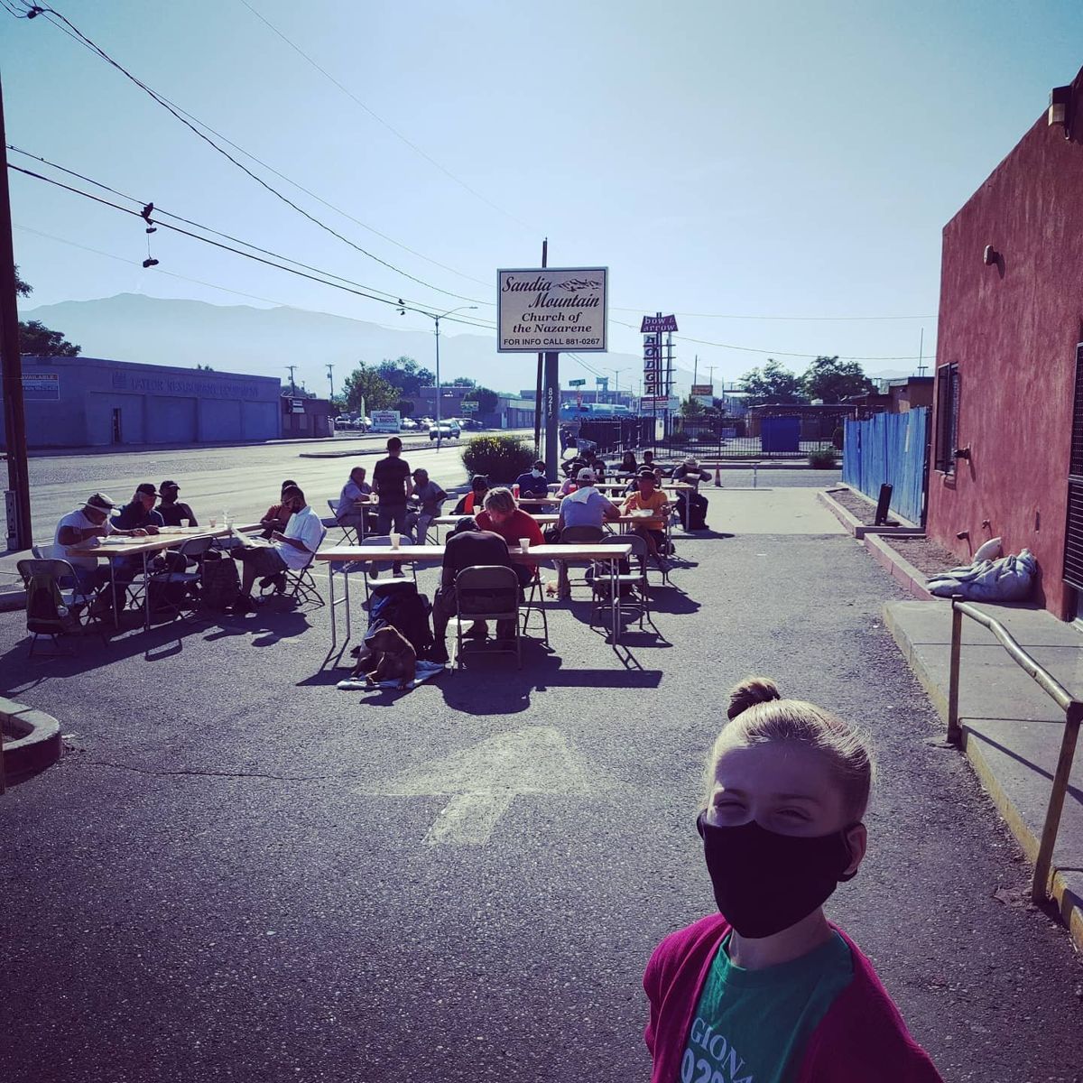 Neighbors sharing Sunday breakfast at tables outside ABQ Central